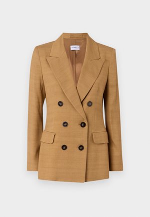 Blazer croisé en tissu beige, doté d'un col cranté, de deux poches avant et de boutons noirs. Texture lisse, design structuré.
