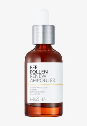 Bernsteinfarget dråpeflaske merket "Bee Pollen Renew Ampouler" for gjenoppretting og reparasjon av hudens tetthet fra MISSHA, 40 ml.