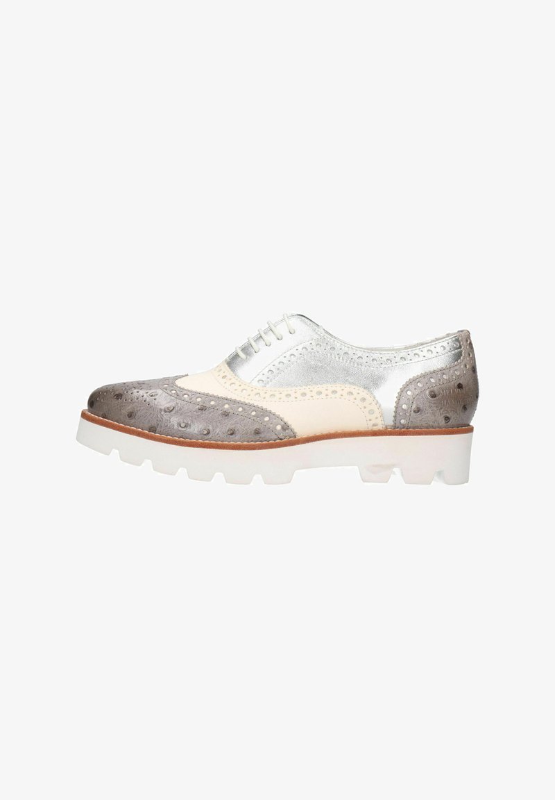 Herr oxfordskor med en silvermetallisk ovandel, grå texturerade accenter och en vit kraftig sula. Brogue-dekoration längs kanterna.