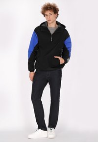 Schmuddelwedda urban rain - Chaqueta outdoor - schwarz königsblau colorblock