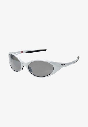 White plastic sunglasses with large oval lenses, gray tinted. Features black ear grips and a small logo on the frame. Smooth finish.