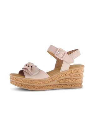 Wedge sandals in soft pink leather with a bow detail on the strap. Cork-like textured sole with a layered design and adjustable ankle strap.