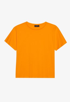Kortermet, rundhalset T-skjorte i lys orange bomull. Enkel design, glatt tekstur og rett snitt uten mønstre eller detaljer.