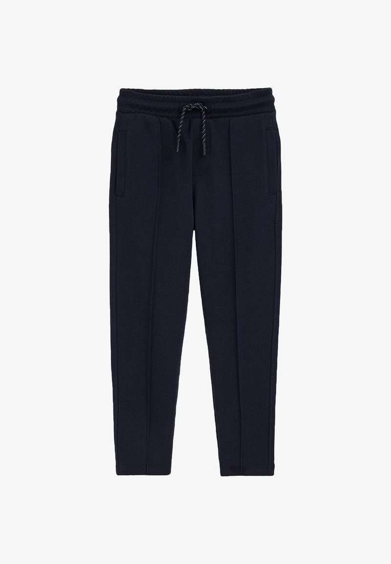 Tumši zilas sporta bikses, kas izgatavotas no mīksta materiāla, ar elastīgu jostu un auklu, slīpām kabatām un sašaurinātiem zolei.