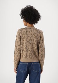 Marimekko EILINEN PIIRTO UNIKKO CARDIGAN - Cardigan - beige/black