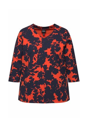 Top a scollo a V con motivo floreale navy su uno sfondo rosso brillante, maniche a tre quarti e vestibilità rilassata. Tessuto in misto cotone.