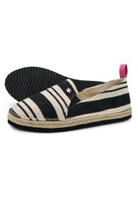 Striped black and cream slip-on espadrille with a natural jute sole. Features a pink heel loop and a small decorative emblem on the upper.