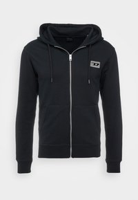 Felpa con zip nera realizzata in tessuto morbido, dotata di cappuccio, tasche frontali e una piccola toppa con logo sul petto. Design atletico classico.