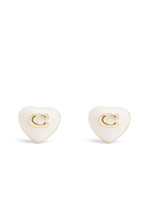 Heart-shaped white earrings with gold edges and raised gold letter "C" in the center on each earring.