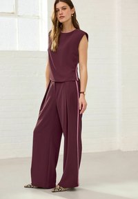 Next Püksid - burgundy red