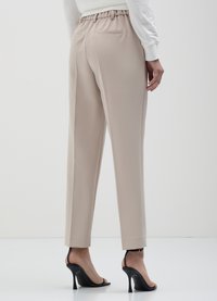 Calliope TINTA UNITA - Pantaloni - beige
