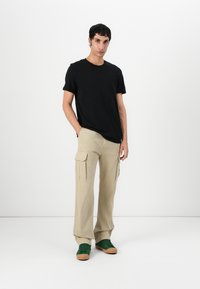 Tommy Jeans OTIS HERRINGBONE PANTS - Cargo trousers - silt