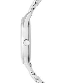 Montre en acier inoxydable avec un boîtier lisse et arrondi, une couronne texturée et un bracelet à maillons. Fini argent poli.