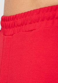 Smilodox JOGGING - DAVID - Jogginghose - rot
