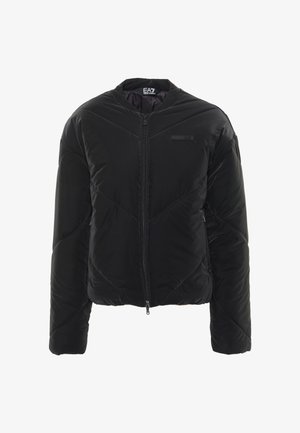 Giubbotto imbottito nero con zip frontale, motivo a quadro, colletto a coste e patch con logo sul petto. Presenta un design accorciato e una texture liscia.