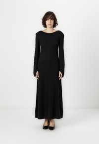 Musthave must-haves: must-have must-haves: Tehnika: Black long-sleeve maxi dress with a boat neckline, made from smooth fabric, featuring a fitted bodice that flows to a loose skirt.