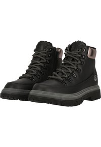 Black leather ankle boots with metallic accents, thick gray rubber soles, patterned laces, and side zipper closure for easy wear.