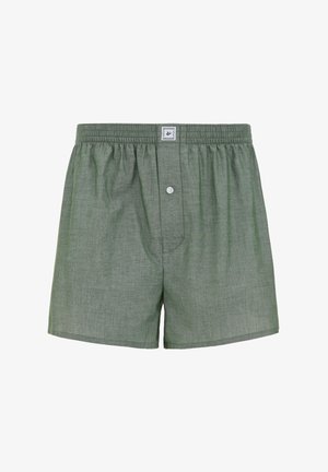 Boxers en coton vert clair avec une finition texturée, ceinture élastique, braguette à un seul bouton et une petite étiquette au niveau de la ceinture.