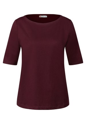 Camicetta bordeaux a maniche corte con scollo rotondo, realizzata in tessuto morbido, caratterizzata da una vestibilità rilassata e cuciture sottili all'orlo.