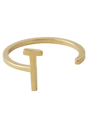 Bague ouverte en or avec une barre verticale formant un T sur une bande lisse et étroite sur fond blanc.