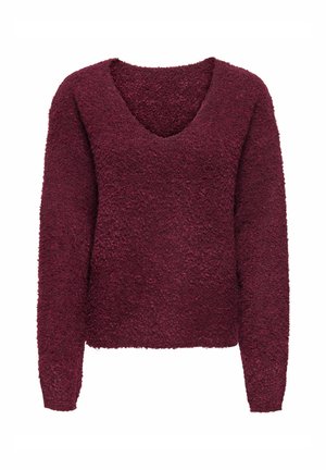 Bordeaux sweater met lange mouwen, V-hals en textuurpluche stof. Heeft een losse, cropped pasvorm en een zachte, fuzzy uitstraling.