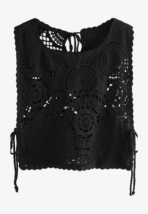 Black crochet top featuring circular and floral patterns, a wide neckline, and adjustable ties on the sides for a customizable fit.