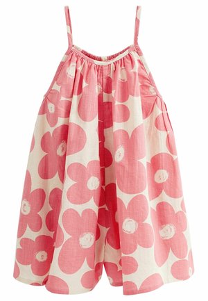 Robe en coton à fines bretelles, ornée de grandes fleurs roses sur un fond blanc cassé, avec un design plissé et une texture légère.