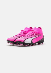 Puma Botines de fútbol para terreno firme - pink