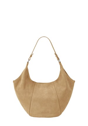 Light brown suede shoulder bag with a curved top and adjustable strap featuring metal buckle details.
