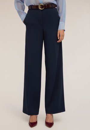 CON IMPUNTURE - Pantaloni - blu