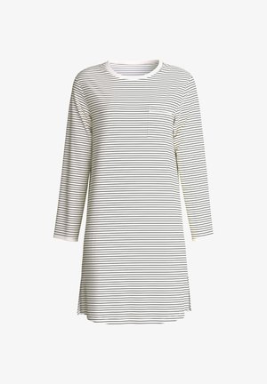 Wit jurkje met lange mouwen en dunne zwarte horizontale strepen, ronde halslijn, klein borstzakje en zijsplitten aan de zoom.