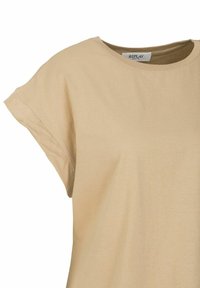 Beige katoenen t-shirt met een relaxte pasvorm en korte mouwen, voorzien van een ronde halslijn en het merklabel "REPLAY" zichtbaar aan de binnenkant.