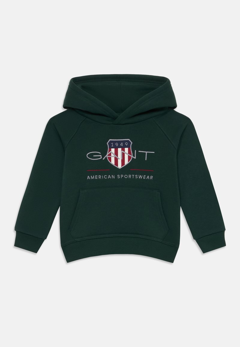 Sudadera verde oscura de algodón con un bolsillo canguro. Presenta un logo bordado con franjas rojas y blancas y el detalle "1949".