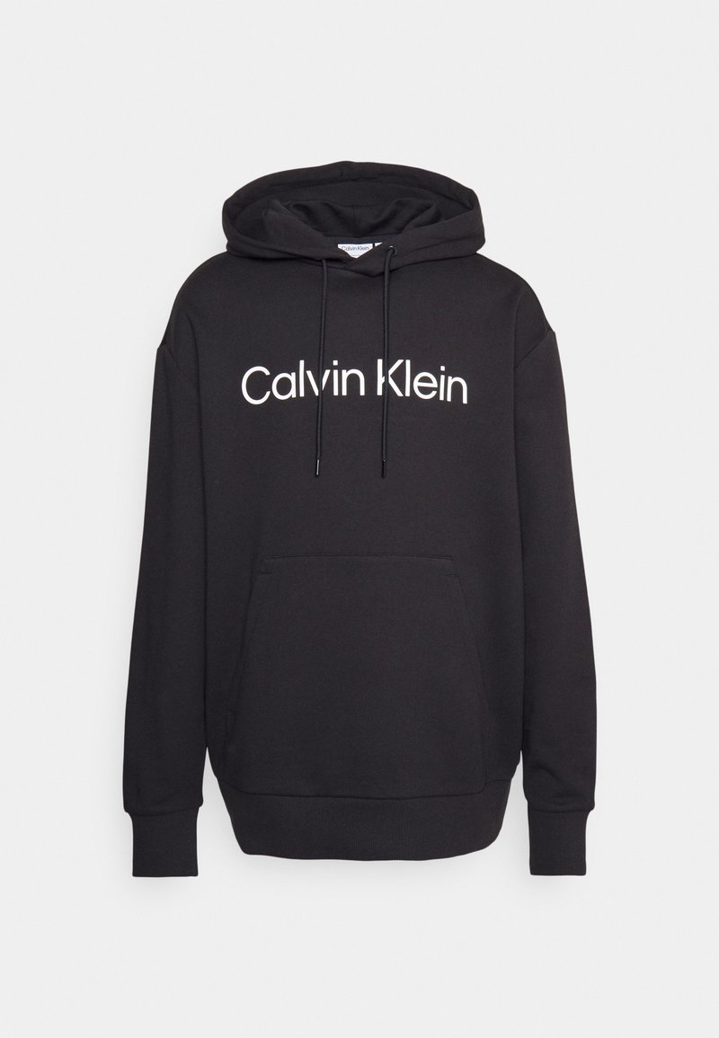 Black hoodie made of soft fabric, featuring a front pocket, drawstring hood, and the "Calvin Klein" logo in white across the chest.