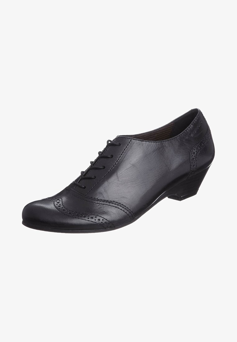 Chaussure Oxford pour femmes en cuir noir avec un petit talon empilé, des détails brogue et une fermeture à lacets à l'avant.