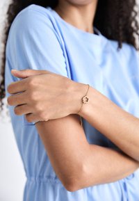 COACH PAVE TEAROSE - Pulsera - gold-coloured