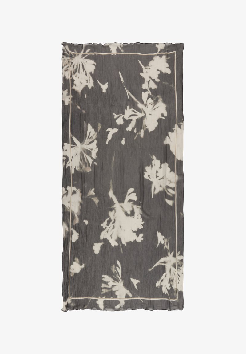 Écharpe rectangulaire gris foncé avec des motifs floraux abstraits blancs et une fine bordure claire le long des bords.