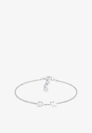 Sølv kædearmbånd med en snefnit og rensdyr charm. Enkel design med en sikker lås og justerbar længde. Glat tekstur.