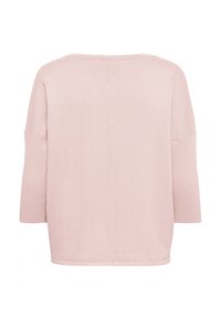 Pull rose clair à coupe décontractée, manches larges 3/4 et texture côtelée. Comprend une couture centrale dans le dos. Matière douce et légère.