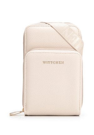 Petit sac bandoulière rectangulaire en cuir crème avec poche avant zippée et sangle en tissu réglable, logo doré "WITTCHEN" sur la poche avant.