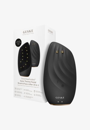 GESKE zwarte sonische thermo gezichtsborstel en gezichtsversteviger met gouden bolletjes, afgebeeld naast witte productverpakking met opgesomde kenmerken.