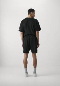 EA7 Emporio Armani Pantaloni sportivi - nero