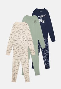 Trois ensembles de pyjamas pour enfants : crème avec un imprimé de dinosaures, vert, et marine avec un squelette de dinosaure. Tissu en coton doux, manches longues et pantalons.