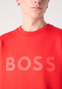 BOSS SALBO - Melegítőfelső - open red