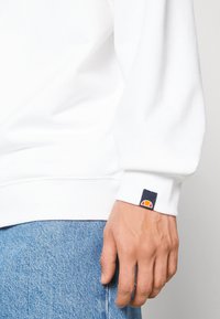 Ellesse PARSOL UNISEX - Mikina - white