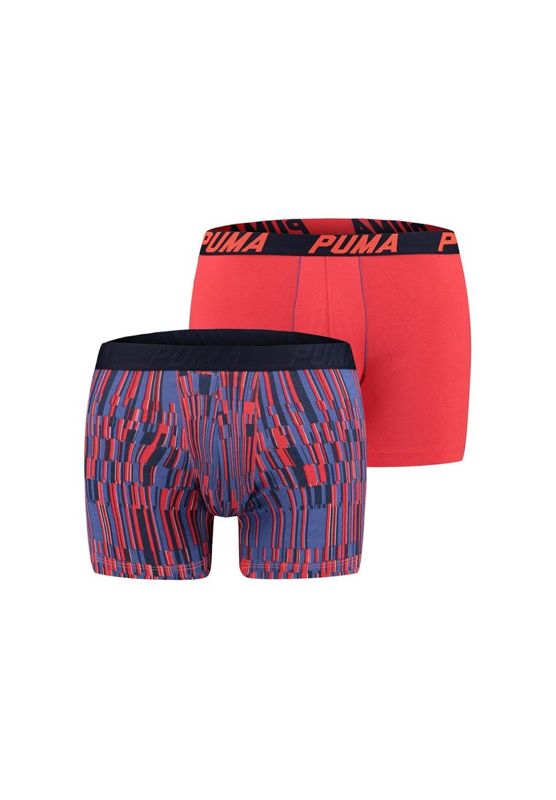 Two pairs of men's boxer briefs: one solid red and one patterned in blue, red, and black vertical stripes. Both feature a black Puma waistband.