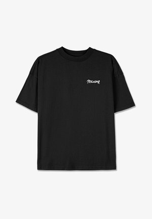 T-shirt de algodão preto com um ajuste relaxado, mangas curtas e decote redondo. Apresenta o texto impresso em branco "TEGADOR" no peito.