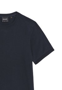 Maglietta a maniche corte di colore blu navy, realizzata in cotone morbido. Presenta un collo rotondo, polsini a costine e un logo sobrio sull'etichetta interna.