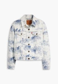 Bílá džínová bunda s modrým potiskem krajiny se zvířaty a kaktusy. Obsahuje límec, dvě náprsní kapsy a zapínání na knoflíky.