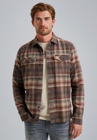 Ruitvormig flanellen shirt in bruin, crème en roestkleur, met een knoopsluiting, twee borstzakken en een relaxte pasvorm.